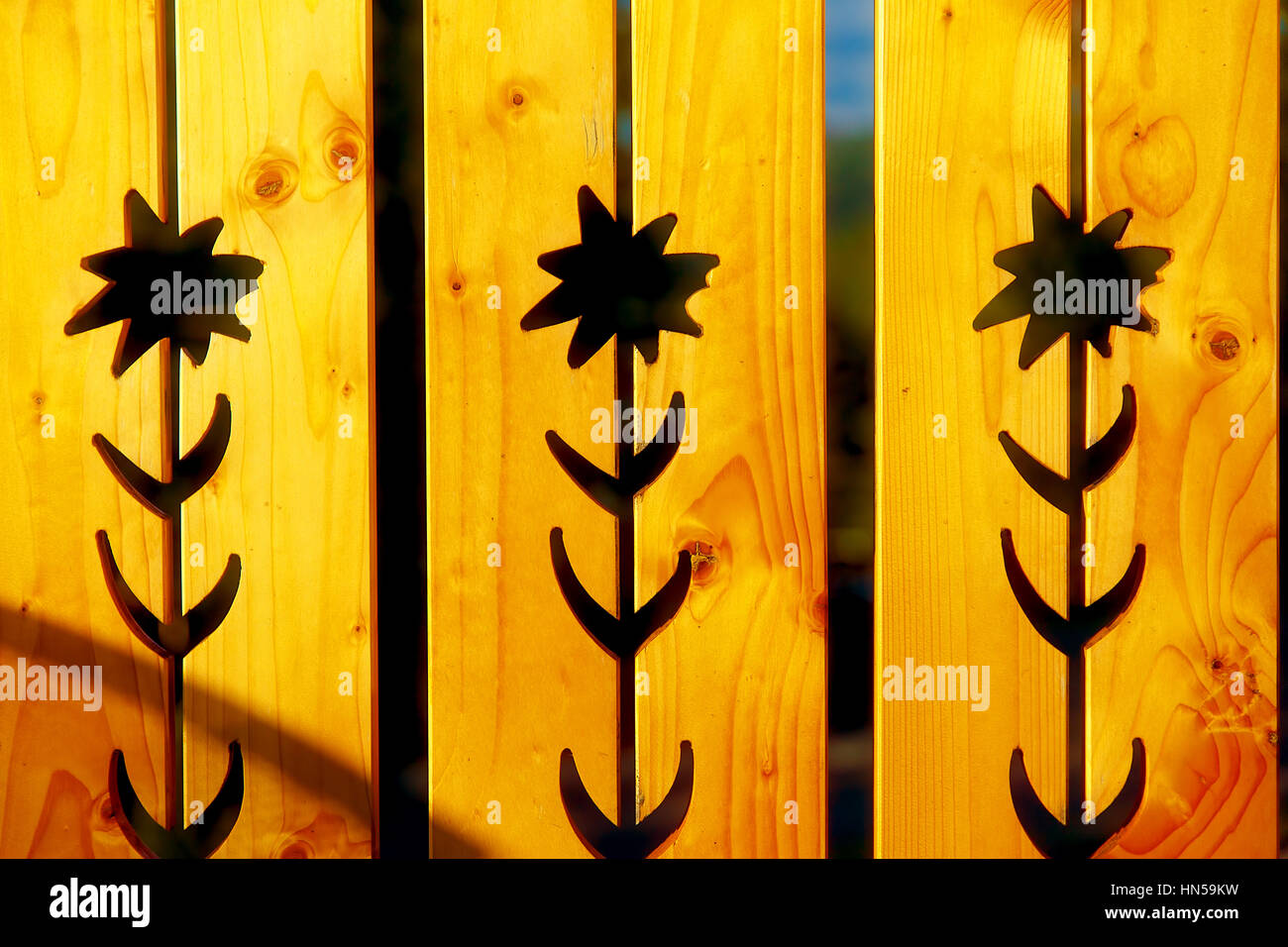flower pattern on wood, Yellow wooden background. Stock Photo