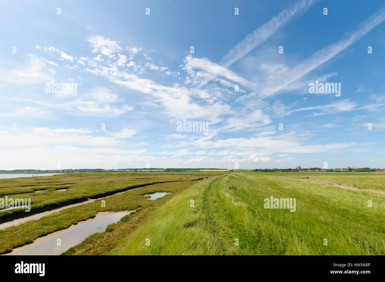 Footpath along the river Ore salt marsh near Orford, Suffolk, England, UK Stock Photo