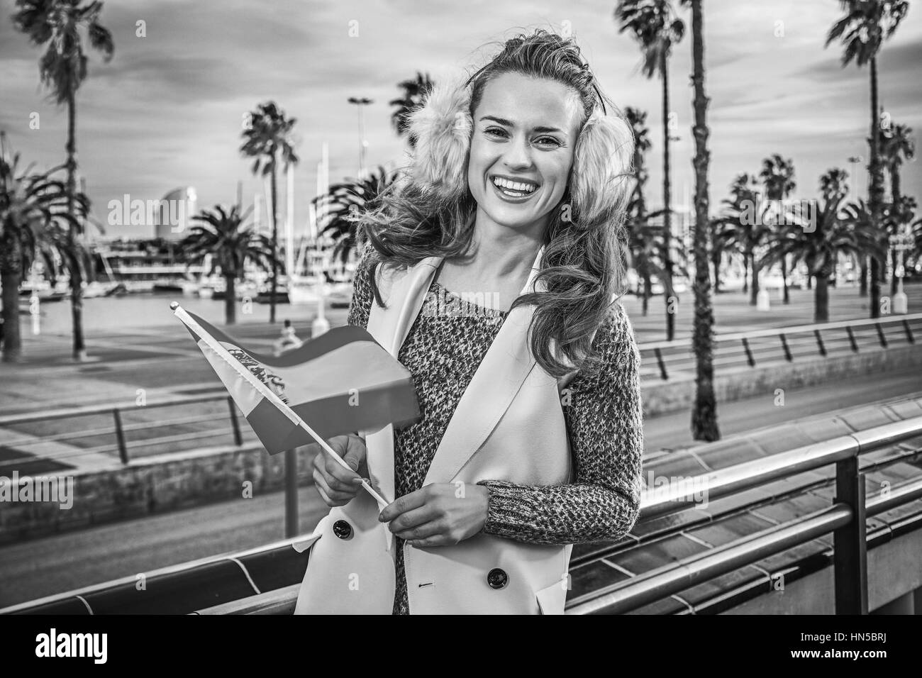 in Barcelona for a perfect winter. smiling modern fashionmonger in