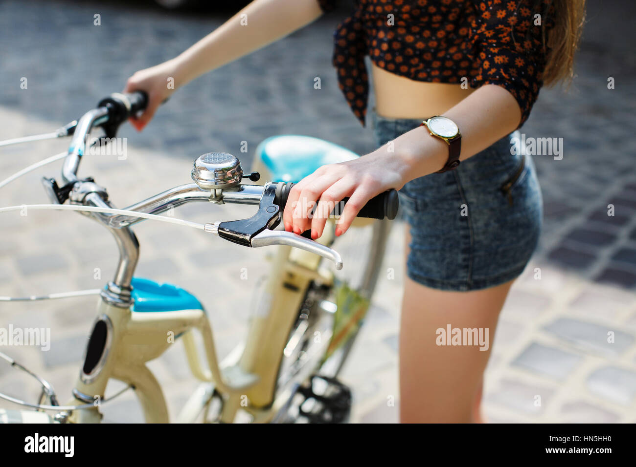 Girl hands and bicycle handlebar Stock Photo Alamy