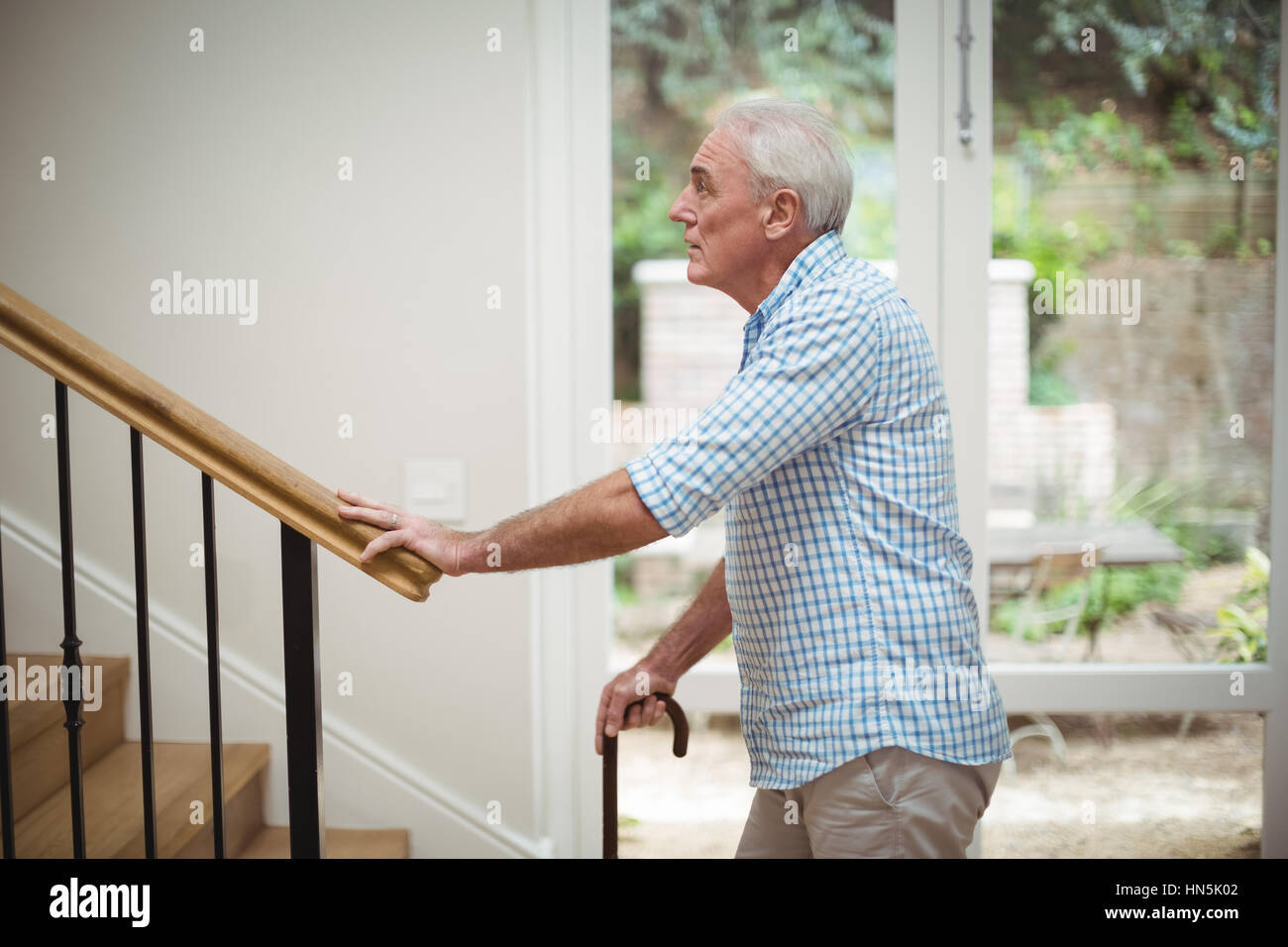 Man upstairs hires stock photography and images Alamy