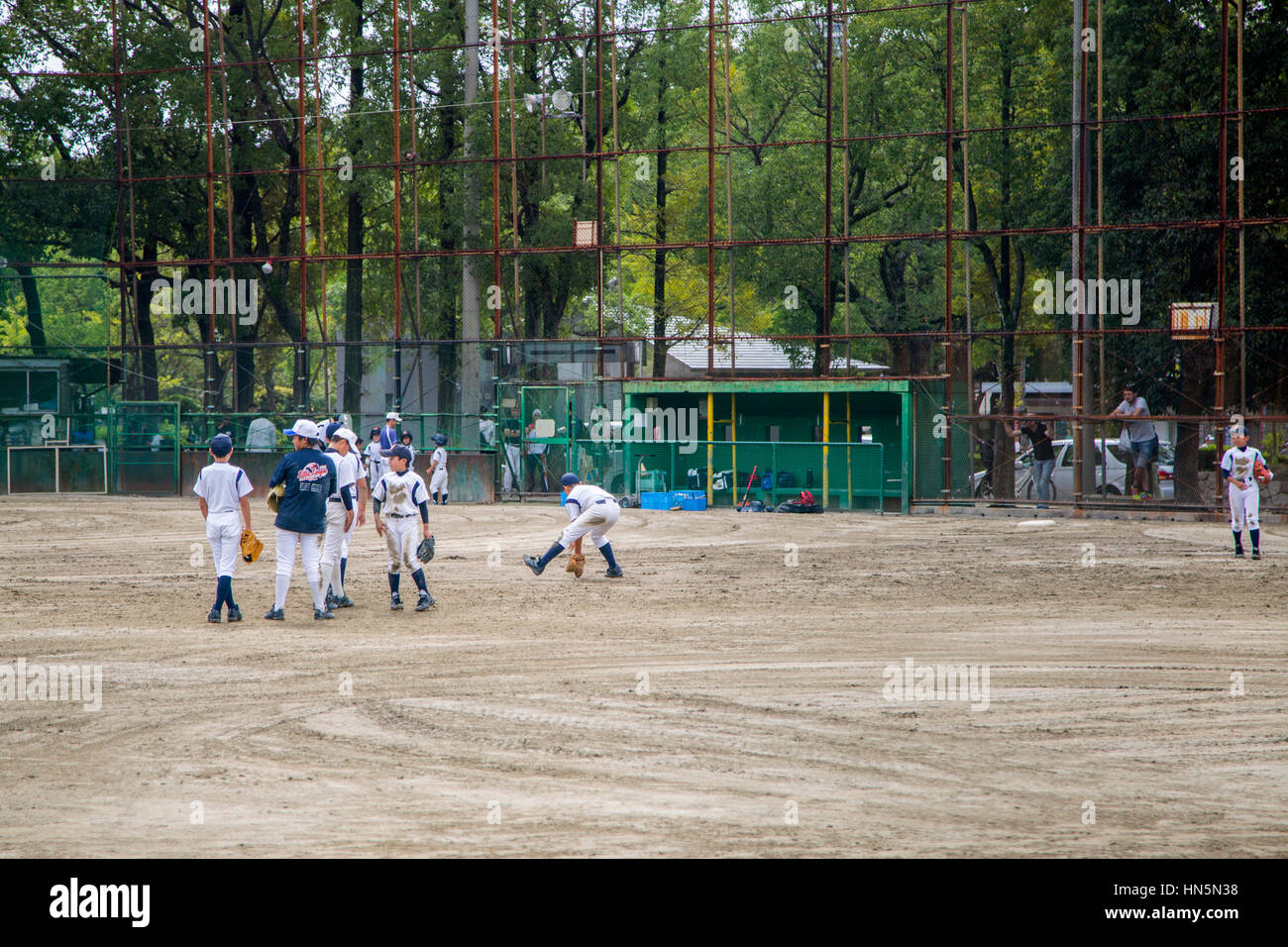 OSAKA, JAPAN OCTOBER 9, 2016 Unidentified kids playing baseball in