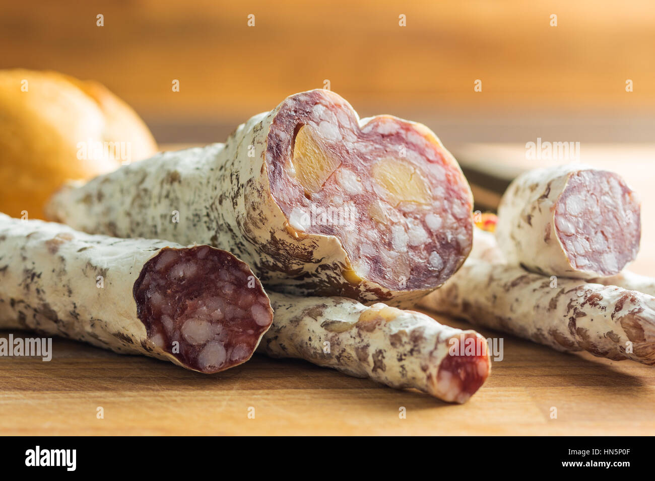 Tasty sliced salami with white mold Stock Photo Alamy