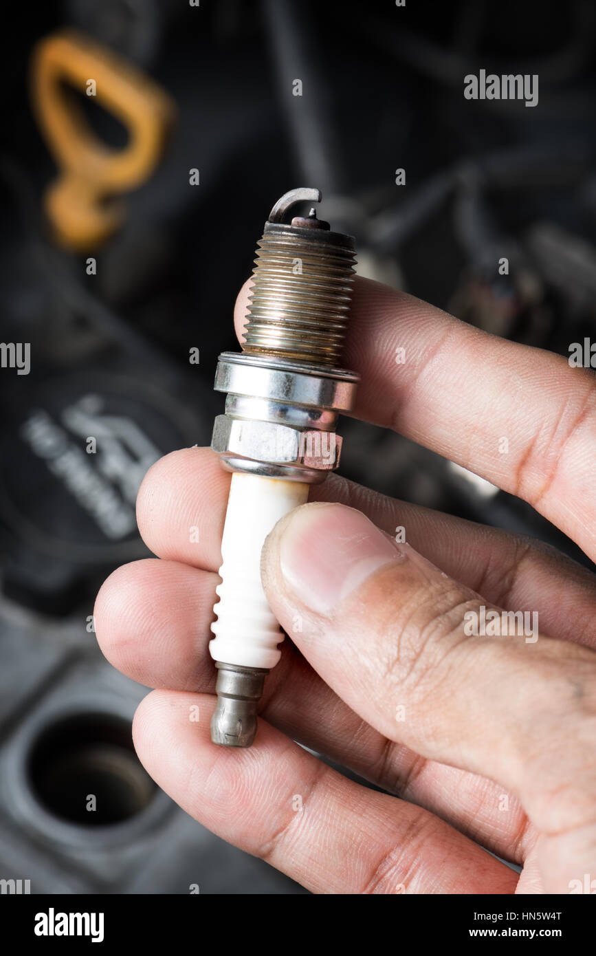 used spark plugs with soot Stock Photo Alamy