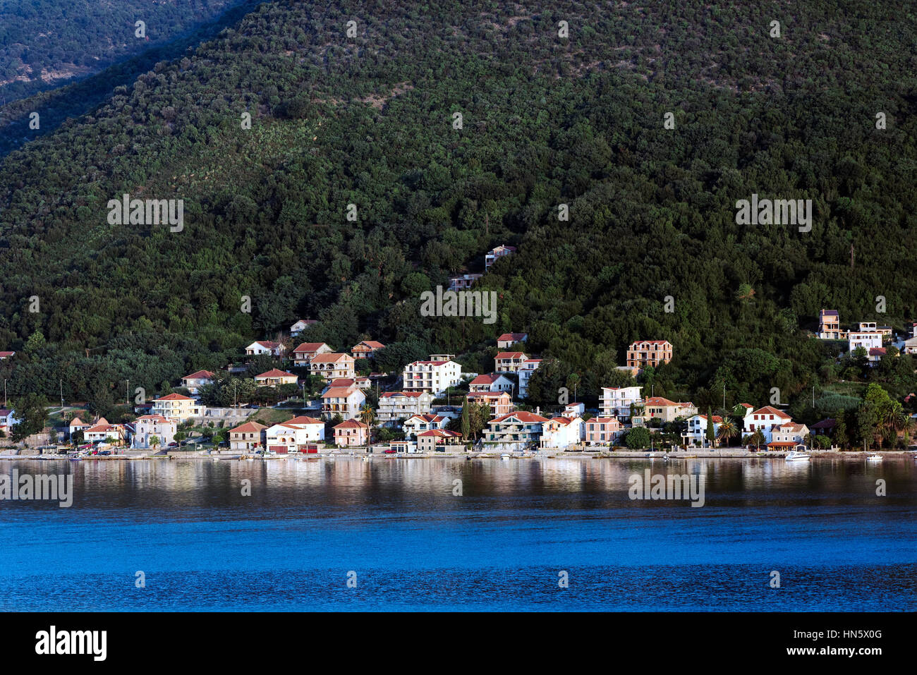 Waterfront village along the Bay of Kotor, Montenegro Stock Photo