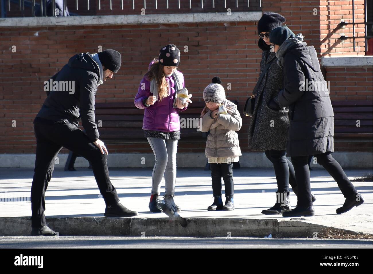 Pierfrancesco Favino with his wife Anna Ferzetti and their daughters Greta  and Lea and their grandmother Claudia Verdini Ferzetti, relaxing in the  park Featuring: Pierfrancesco Favino, Anna Ferzetti, Lea Favino, Greta  Favino,, image size:1300x957
