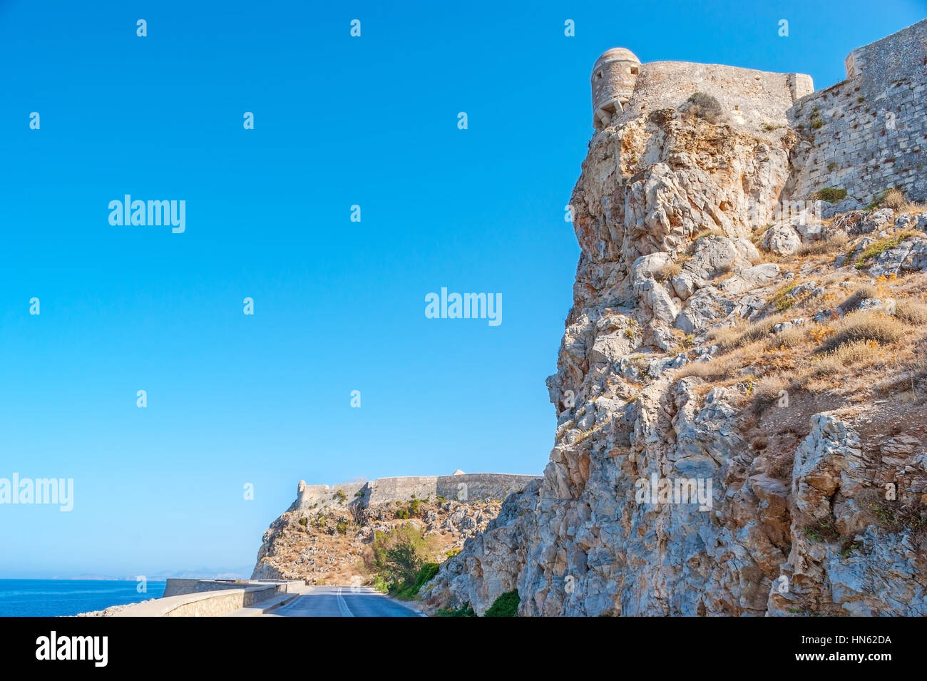 The view on rocky slopes with Venenian citadel on the top, Rethymno, Greece Stock Photo