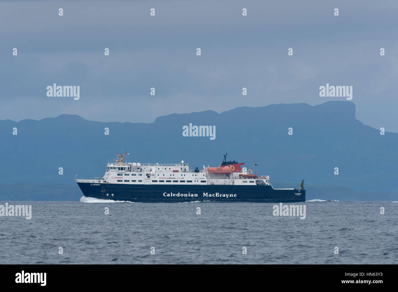 Caledonian MacBrayne ferry “Clansman” passing the isle of Eigg in the Small Isles, Scotland. June 2014. Stock Photo