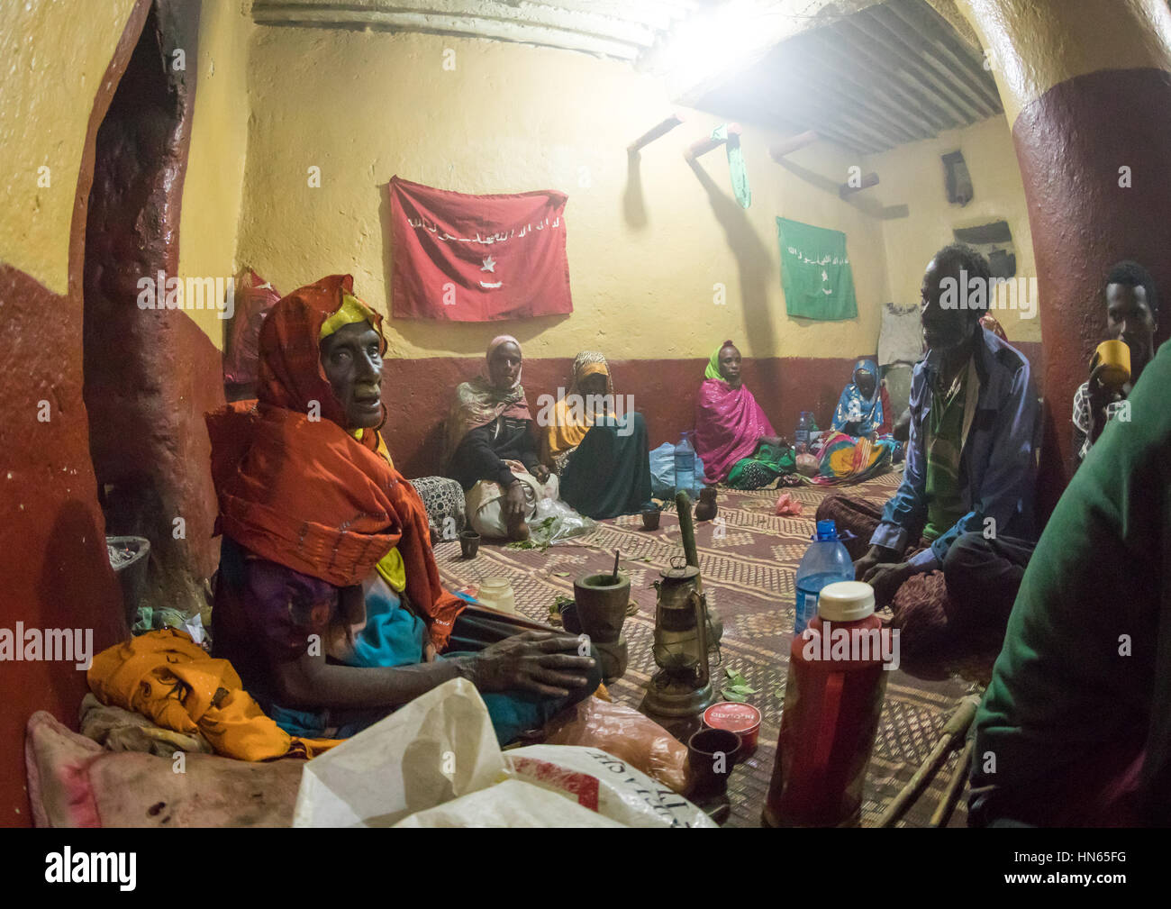 Ethiopian people chewing khat during a sufi ceremony lead by Amir