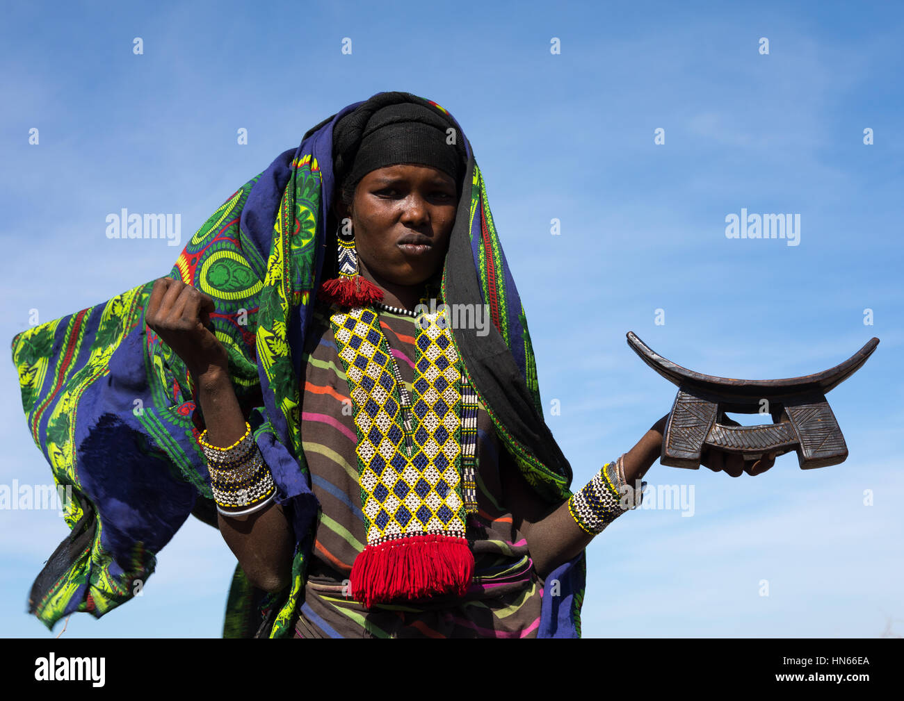 Issa tribe woman with a wooden pillow, Afar region, Yangudi Rassa National Park, Ethiopia Stock Photo