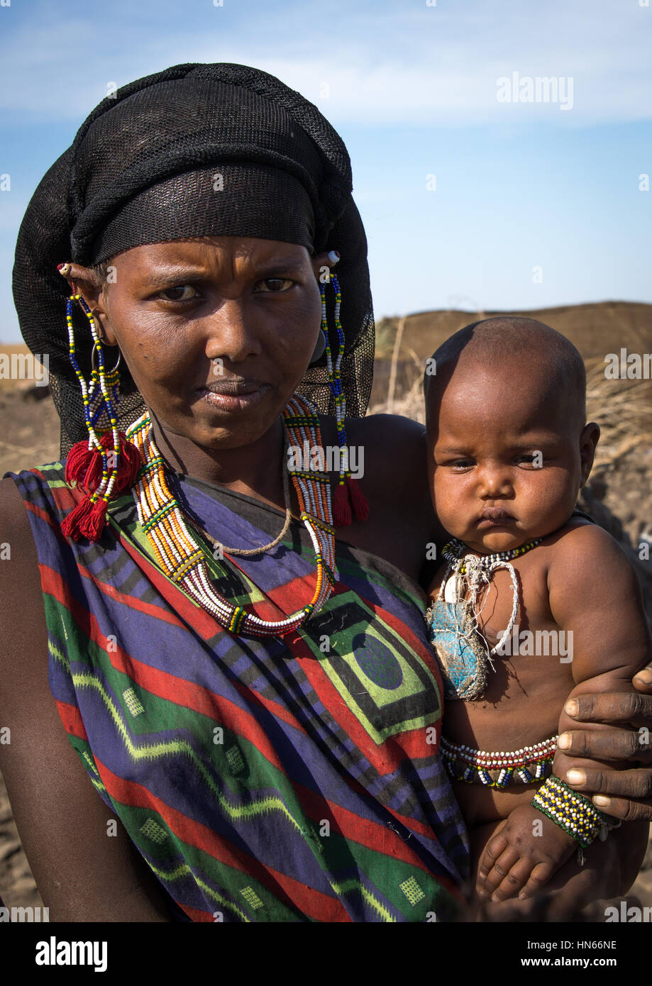 Issa tribe mother with her baby, Afar region, Yangudi Rassa National Park, Ethiopia Stock Photo