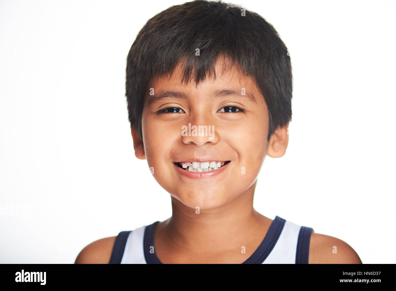 Portrait Of Smiling Hispanic Boy Isolated On White HN6D37 