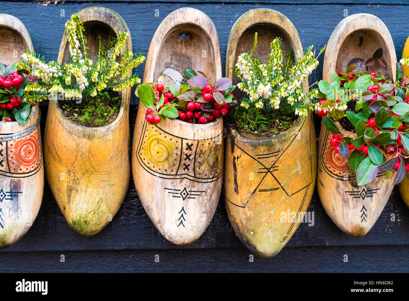 Row Of Shoes With Flowers In Them Stock Photo Alamy Row Of Shoes With Flowers In Them Stock Photo Alamy