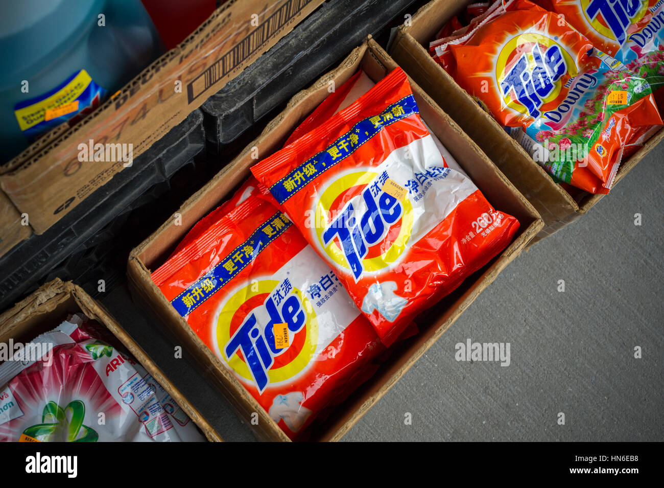 Packages of Procter & Gamble's Tide detergent in English and Chinese in the Melrose neighborhood of the Bronx in New York Sunday, February 5, 2017. Tide is the largest selling detergent in the world. (© Richard B. Levine) Stock Photo