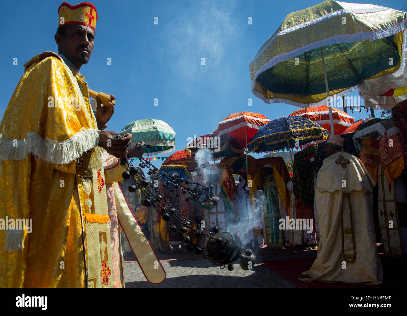 Ethiopian orthodox priests with censers celebrating the colorful Timkat epiphany festival, Amhara region, Lalibela, Ethiopia Stock Photo