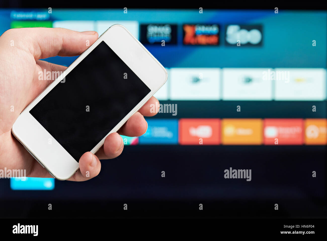 smartphone as smart tv control close up Stock Photo