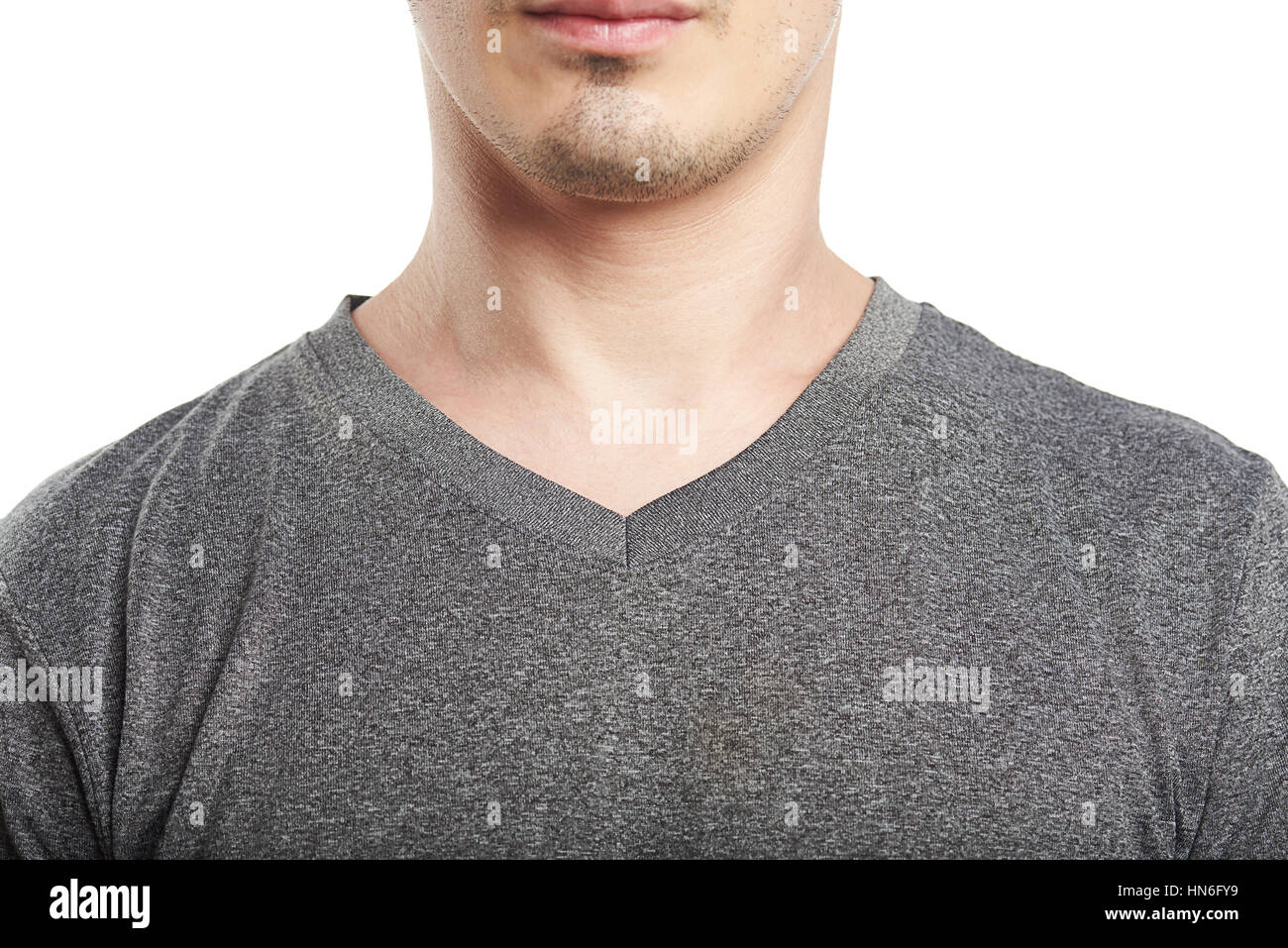 close up of gray v neck t-shirt on mans isolated on white Stock Photo