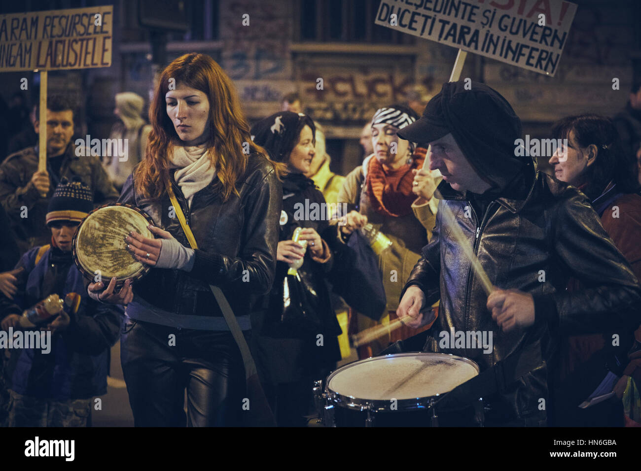 Bucharest, Romania - October 6, 2013: Protesters play the drums during the population uprising against the cyanide gold extraction in Rosia Montana Stock Photo