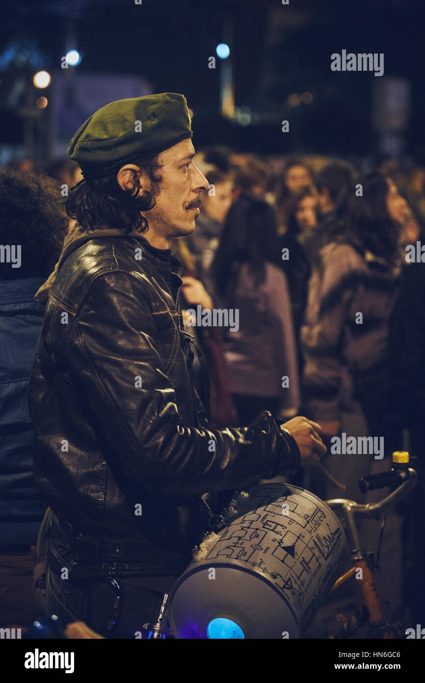 Bucharest, Romania - October 6, 2013: Man protester plays the drum during the uprising against the cyanide gold extraction project in Rosia Montana Stock Photo
