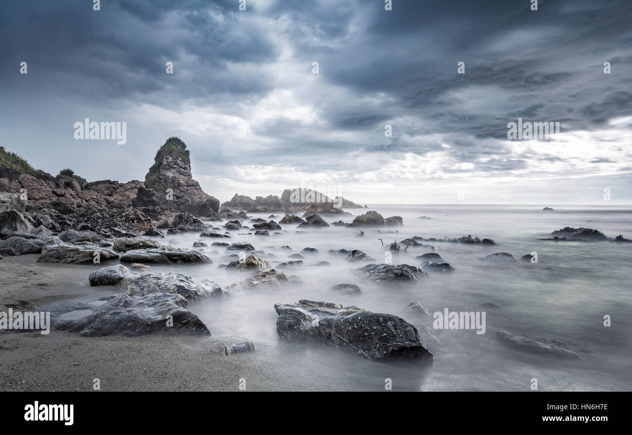 Beach, rain clouds, West Coast Region, Southland, New Zealand Stock Photo