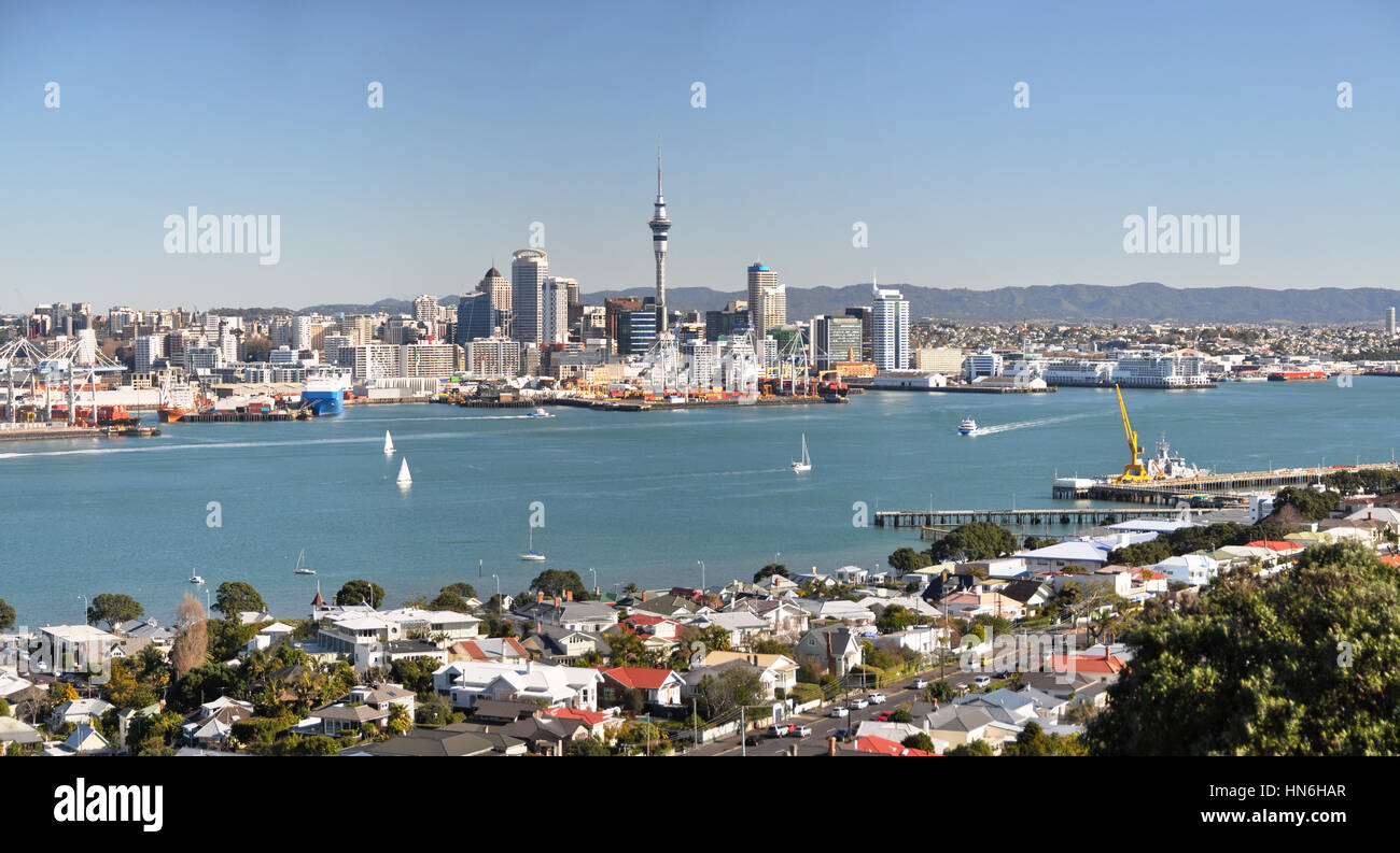 Panoramic view of the suburb of Devonport in the foreground and the Auckland Central Business District and Port are in the background. Stock Photo