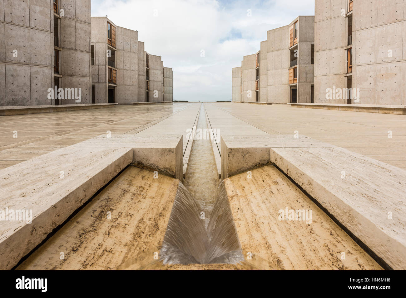 La Jolla, USA - December 10, 2015: Symmetrical architecture of the Salk Institute in San Diego with fountain vanishing point Stock Photo