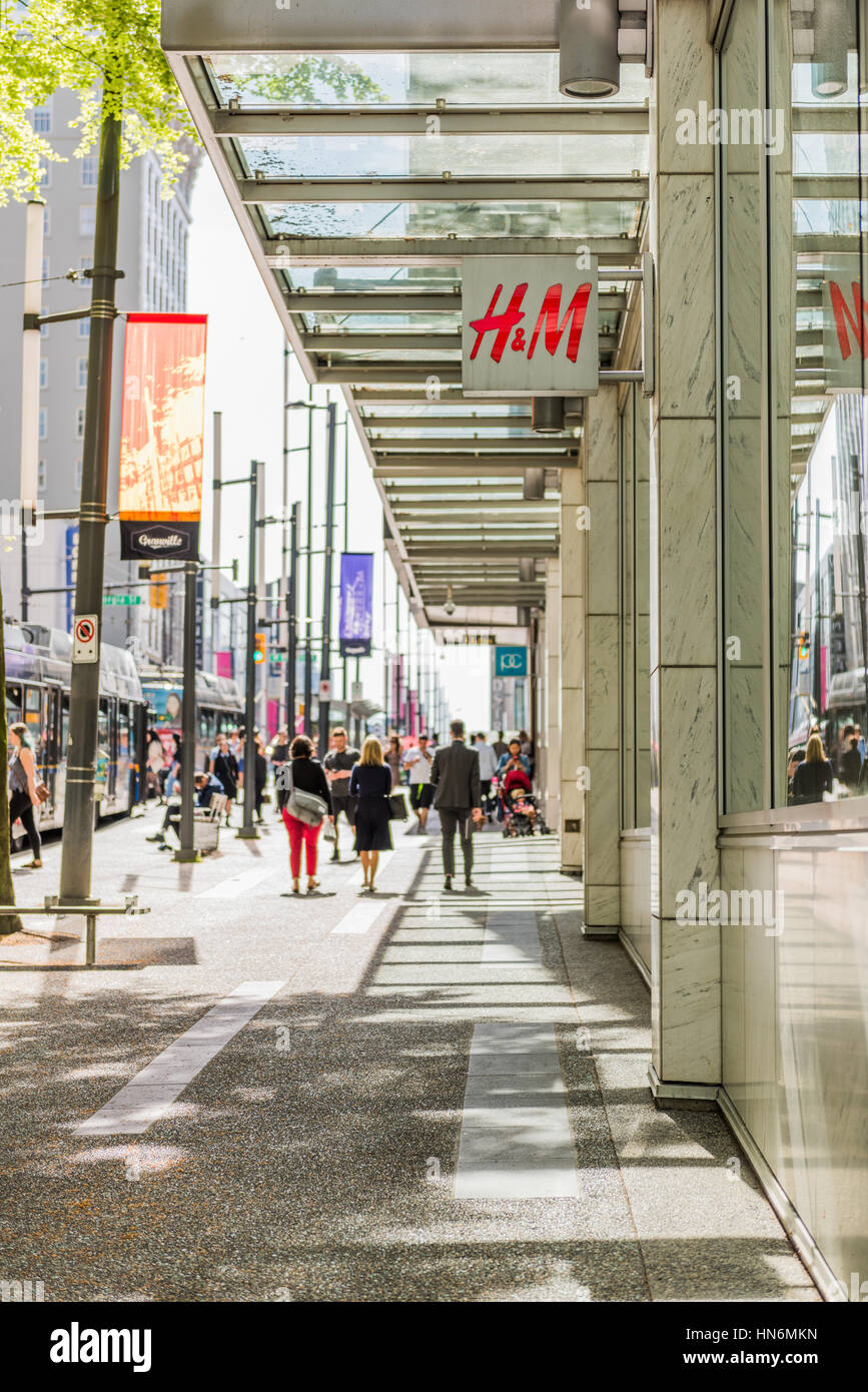 Vancouver, Canada - April 19, 2016: H&M sign and building on streets of  downtown with people walking Stock Photo - Alamy