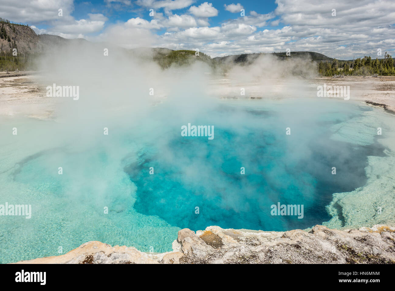 Deep blue Sapphire pool in biscuit basin in Yellowstone National Park hot spring Stock Photo