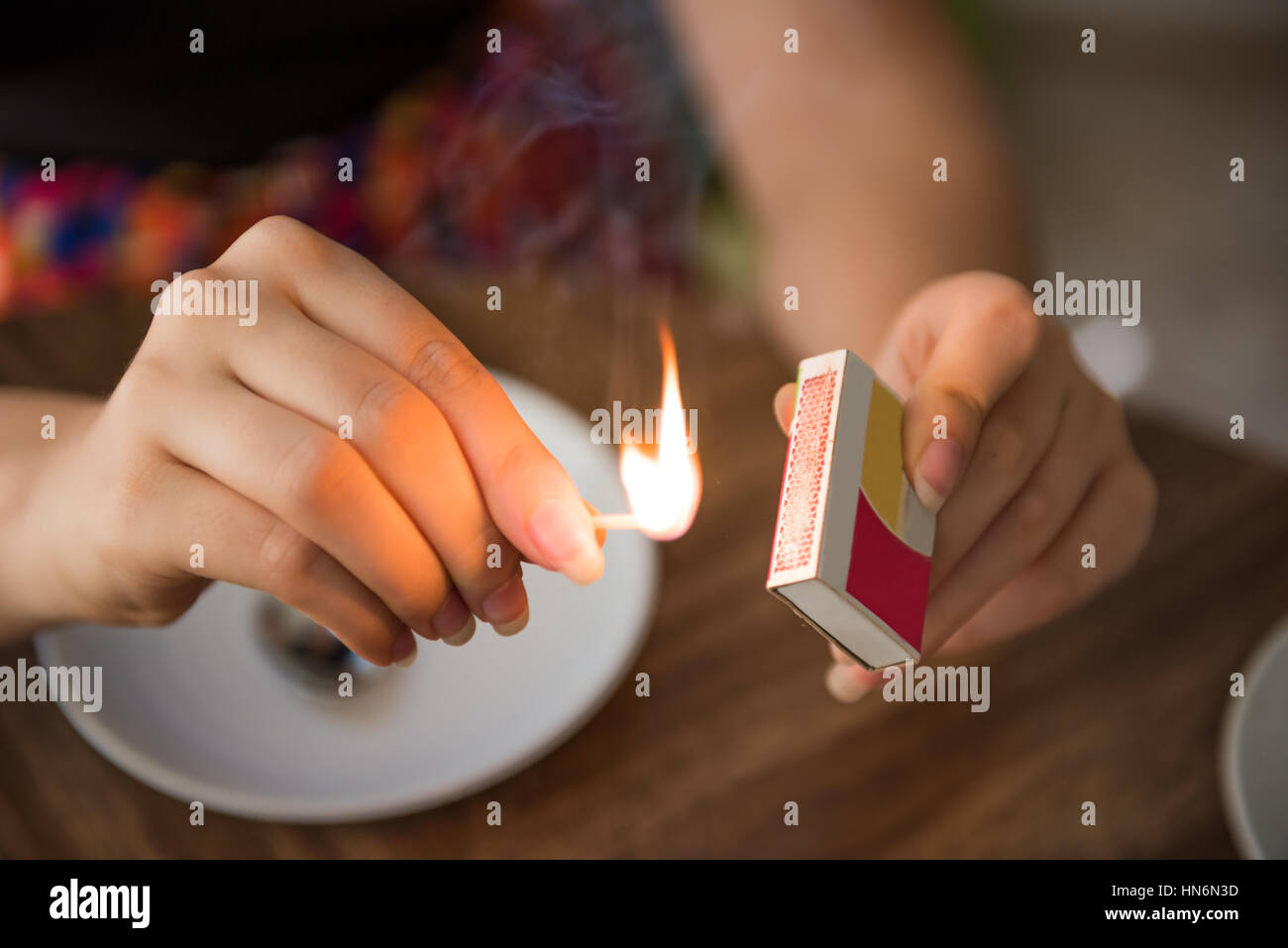 Lighting a match hi-res stock photography and images - Alamy