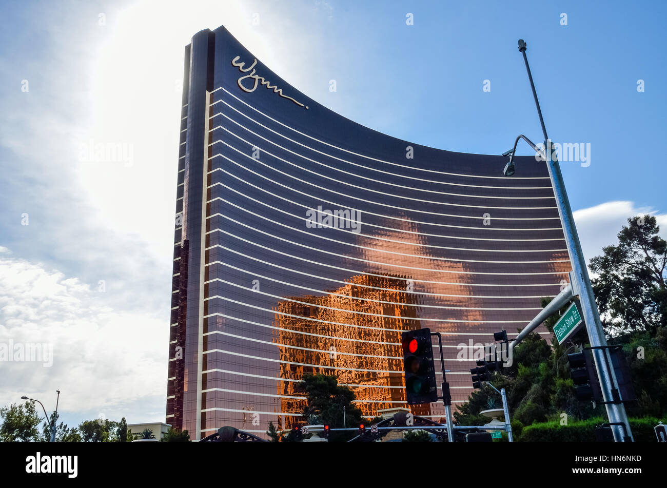 Las Vegas, USA - May 7, 2014: Curved Wynn hotel architecture with reflection and street traffic lights Stock Photo