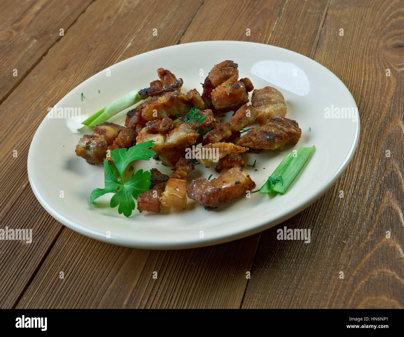 Pork rind skin of a pig. Pork rind is a common ingredient of sausages