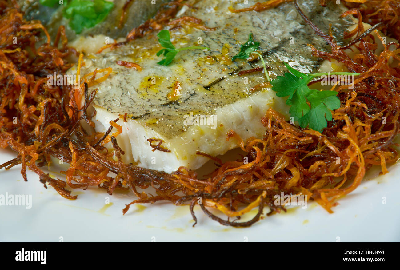Hake with Bayonne Ham. Panfry hake steaks in a bit of olive oil; set