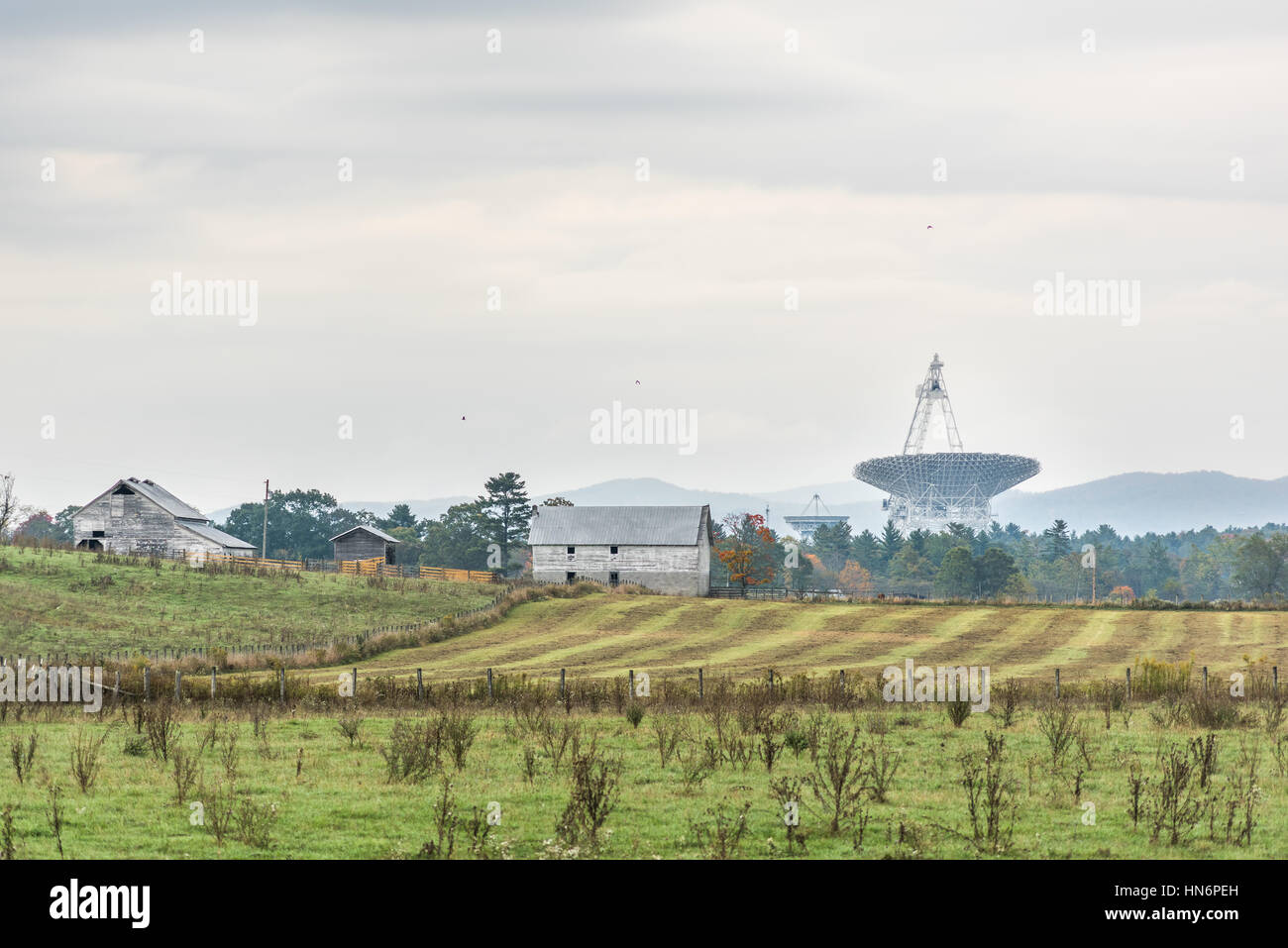 Rural West Virginia farm scenery with Green Bank radio Telescope in distance Stock Photo