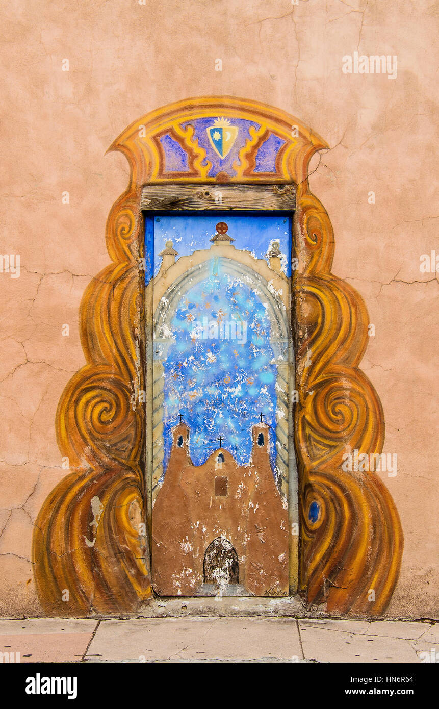Santa Fe, USA - July 30, 2015: Door to San Miguel Mission chapel church, the oldest in the United States, decorated in adobe pueblan style Stock Photo