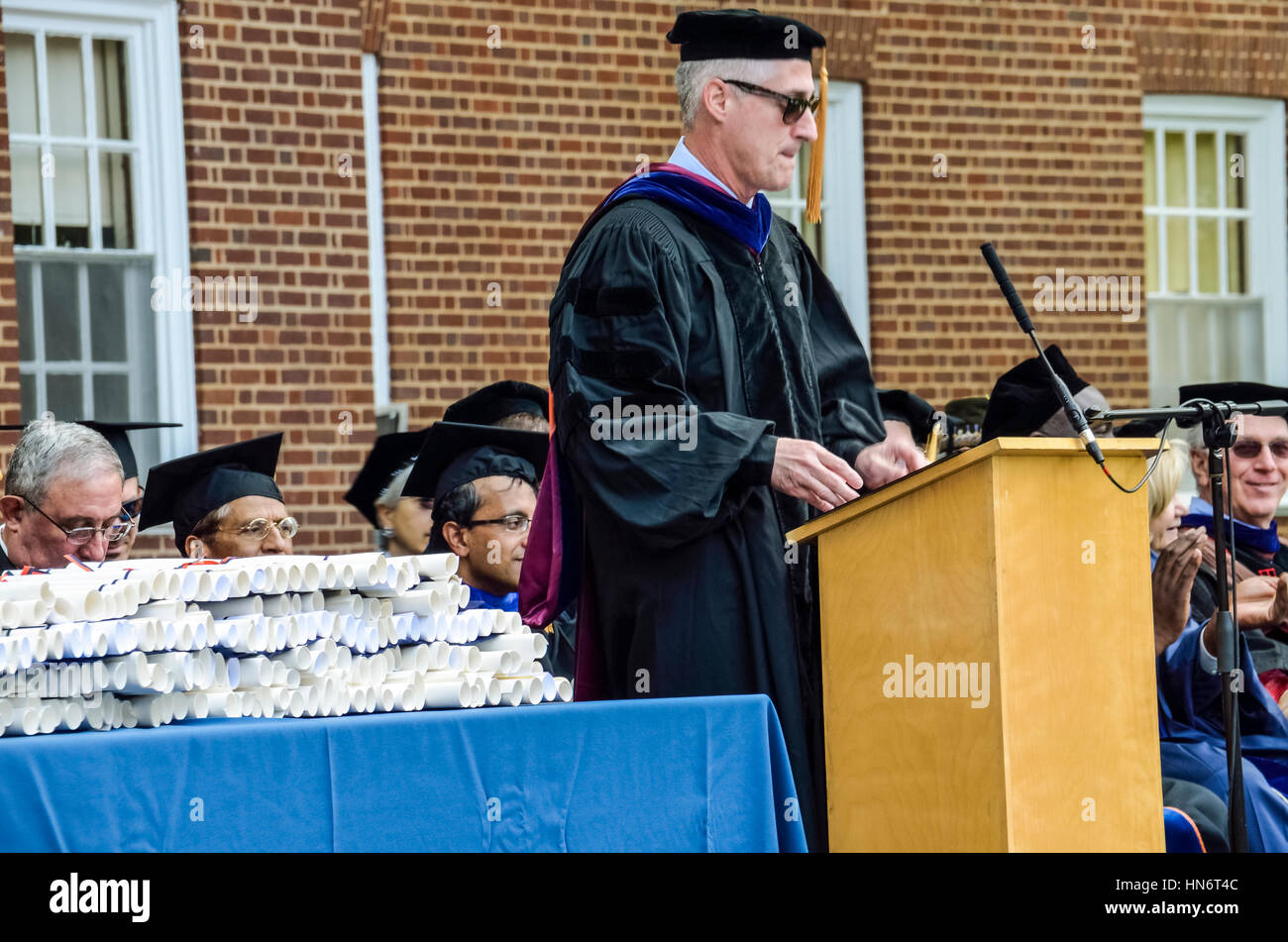 Charlottesville, USA - May 18, 2014: Professors listening to speaker at graduation ceremony at University of Virginia Stock Photo
