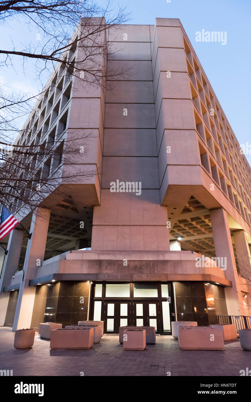 Washington DC, USA - December 29, 2016: FBI, Federal Bureau of Investigation Headquarters, on Pennsylvania avenue sign with American flags Stock Photo