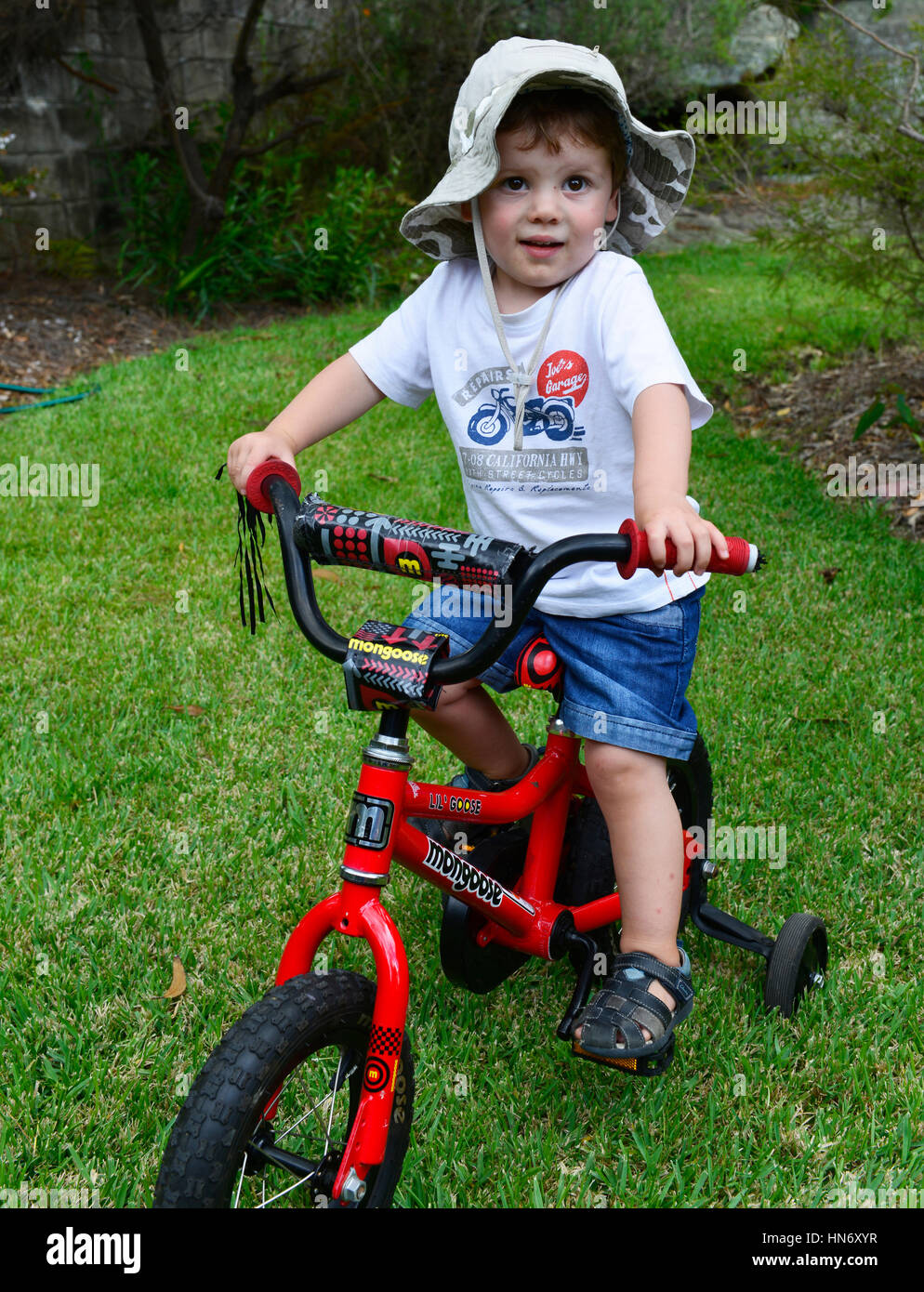 Boy and his bicycle Stock Photo