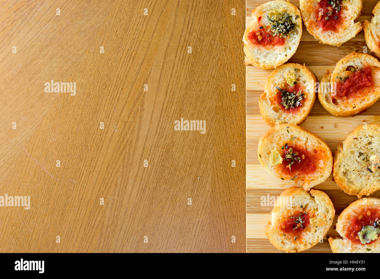 Light and delicious bruschetta appetizers with tomato amd oregano with copyspace Stock Photo