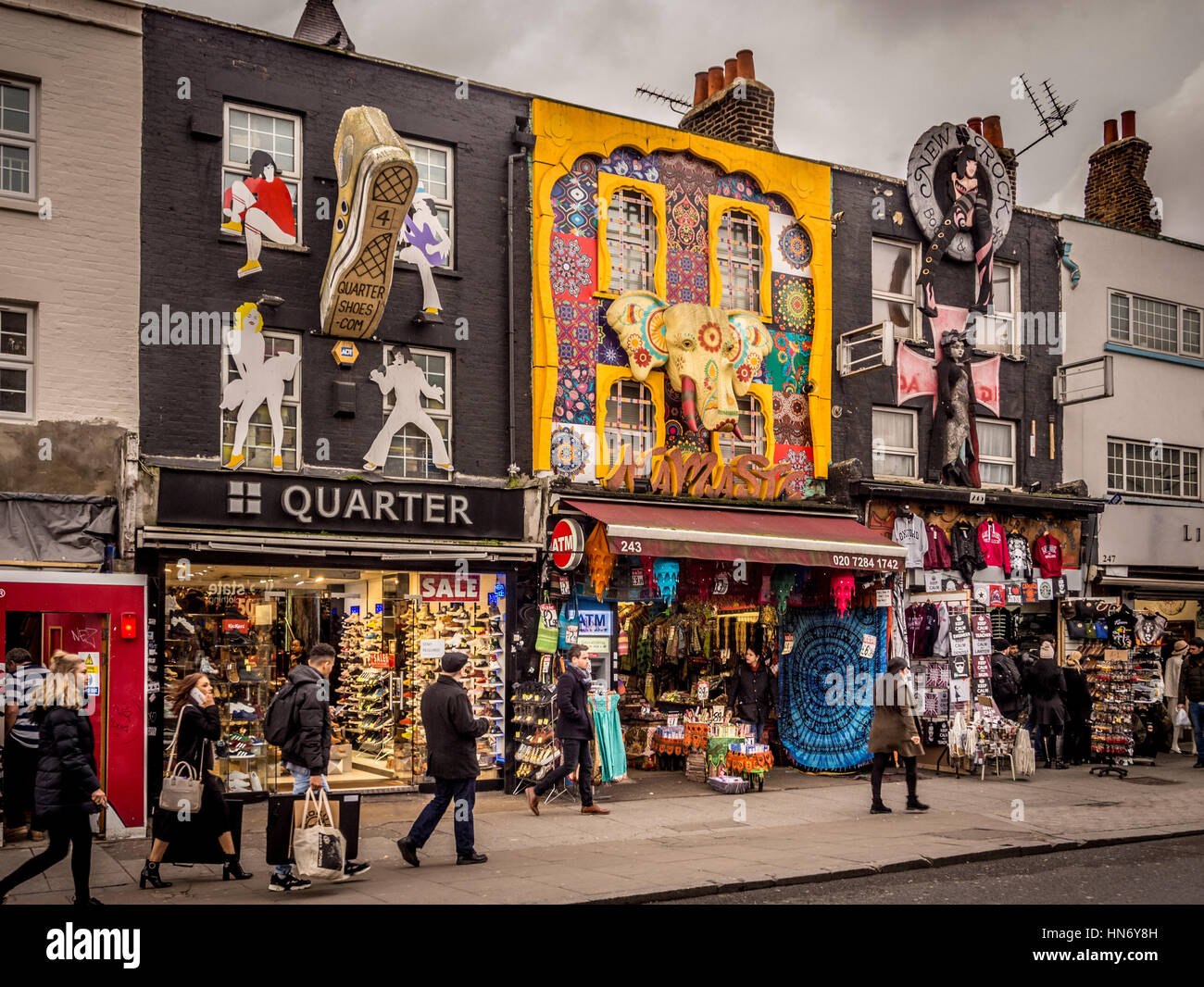 Camden High street with colourful 3d advertising signs on outside of shops, London, UK. Stock Photo