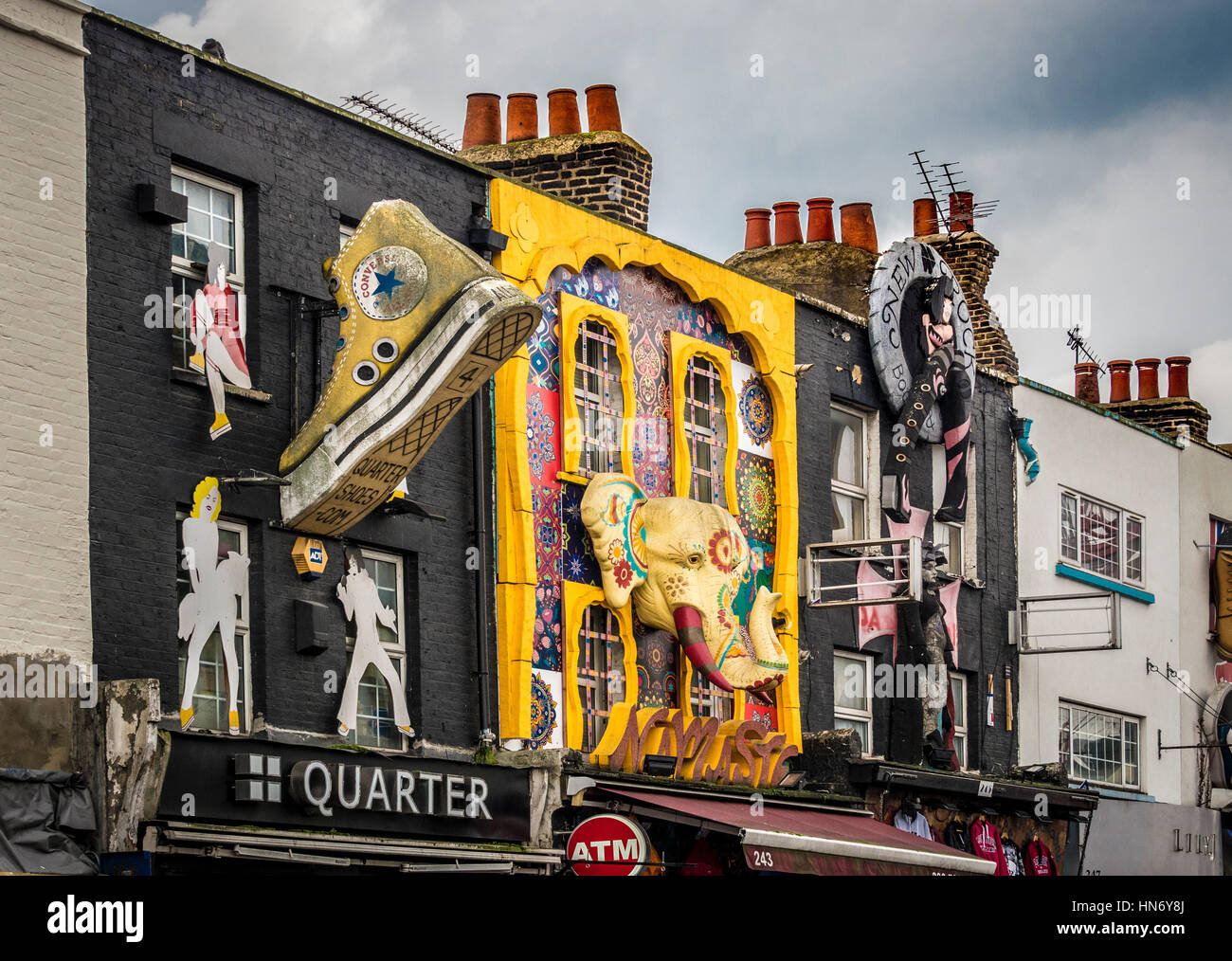 Camden High street with colourful 3d advertising signs on outside of shops, London, UK. Stock Photo