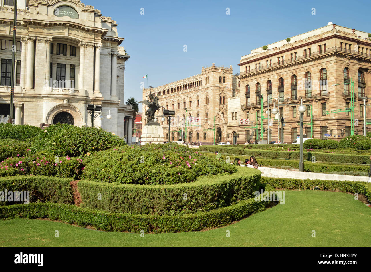 Mexico City, Mexico - November 3, 2014: People spend time in front of the famous Palace of Fine Arts near Alameda Central Park in Mexico city Stock Photo