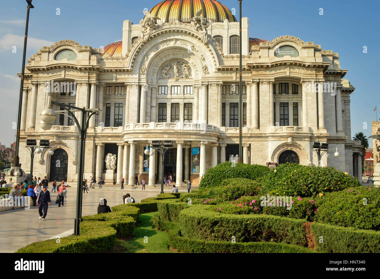 Mexico City, Mexico - November 3, 2014: People spend time in front of the famous Palace of Fine Arts near Alameda Central Park in Mexico city Stock Photo