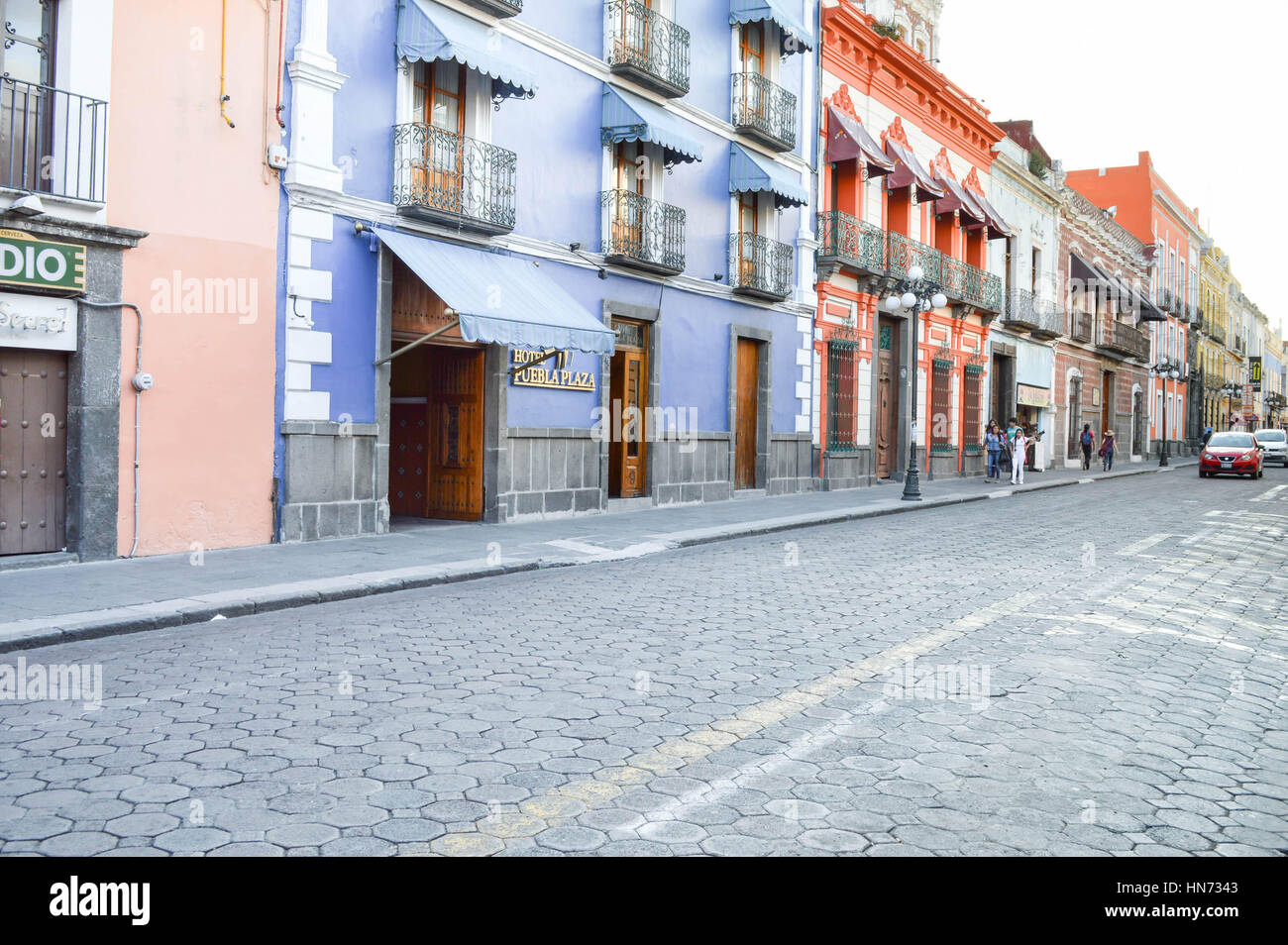 Puebla, Mexico - November 7, 2014: People stroll the streets of the beautiful colonial city of Puebla in Mexico Stock Photo