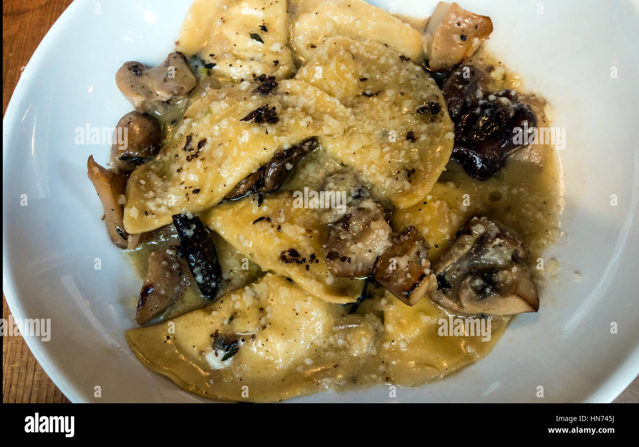 Ravioli with mushrooms and black truffles Stock Photo