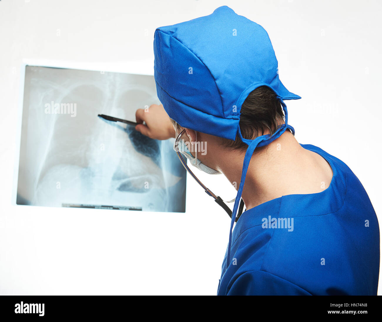 doctor check xray image view from back isolated on white Stock Photo