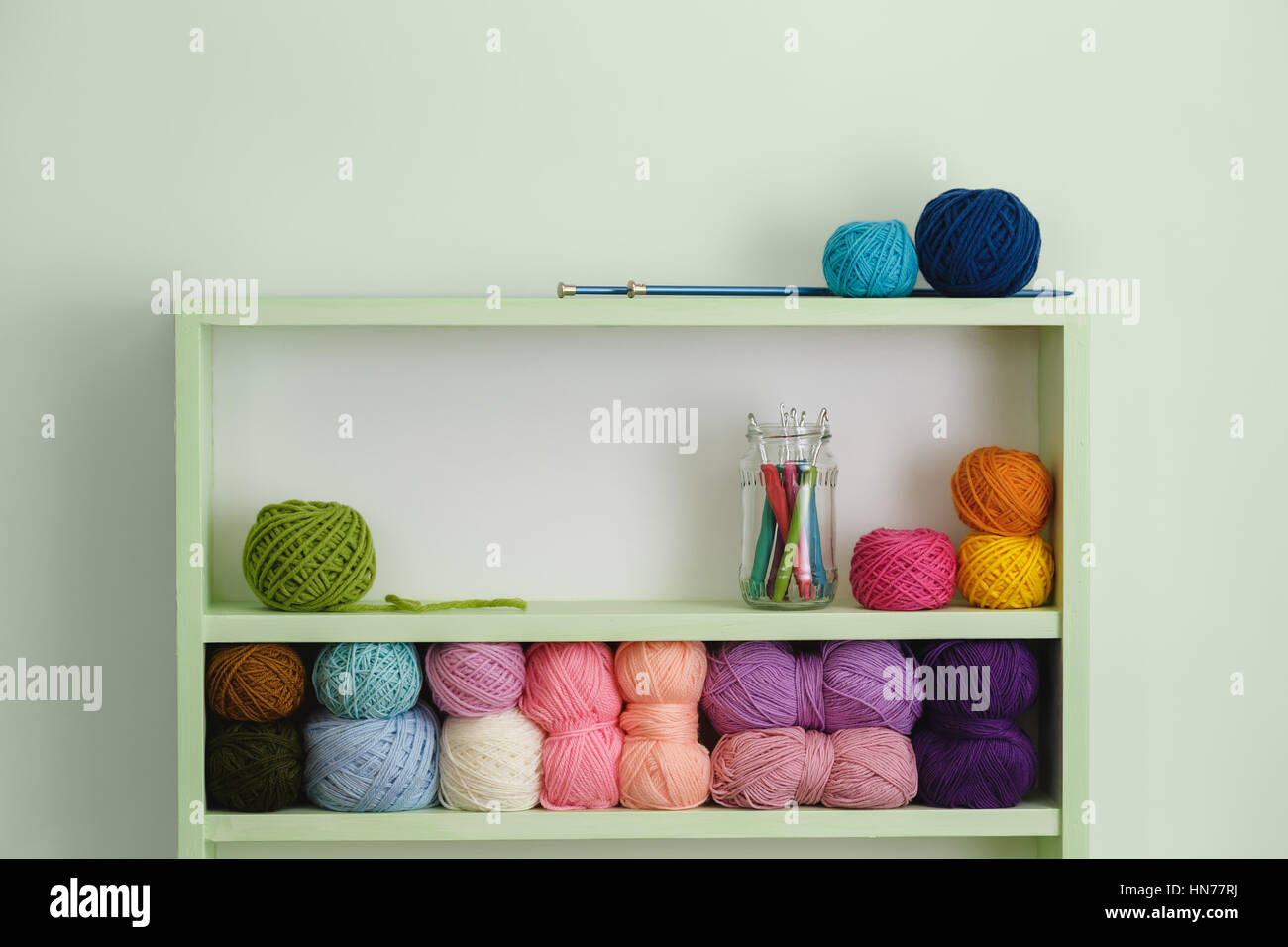 Multicolored Yarns Of Wool For Knitting In Shop Stock Photo - Download  Image Now - Ball Of Wool, Shelf, Storage Room - iStock