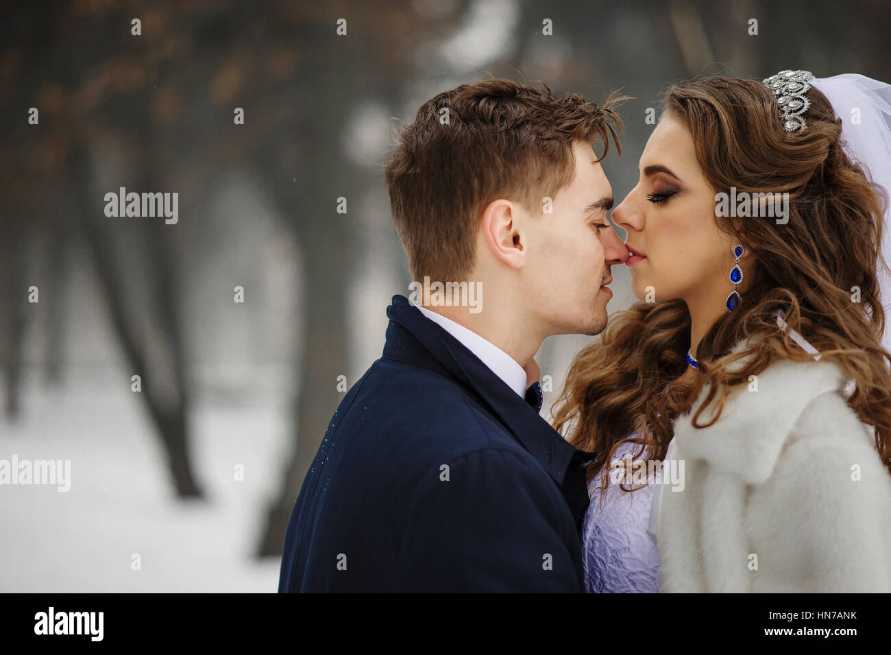 Cute newlyweds kissing on wedding hi-res stock photography and images ...