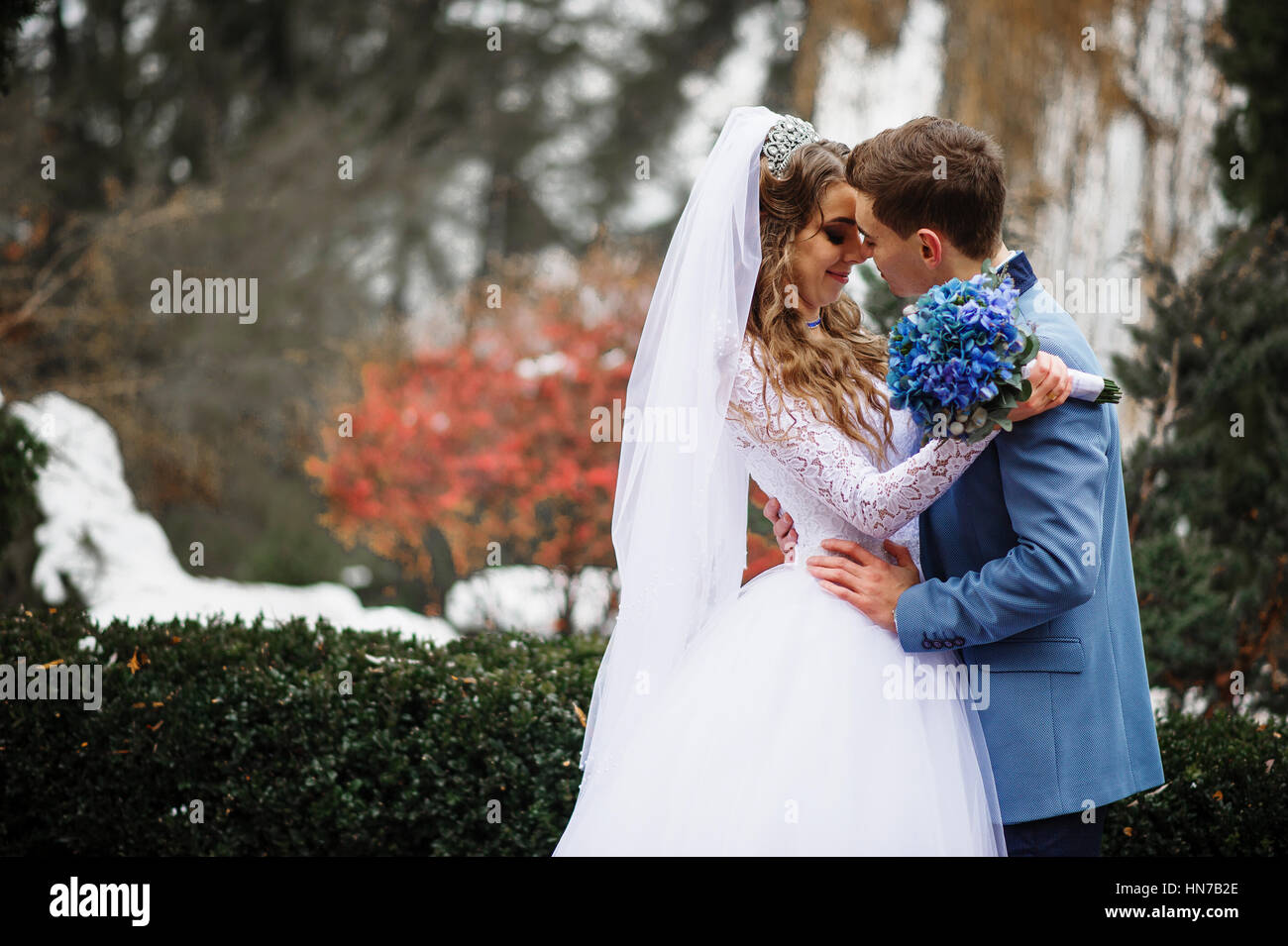 Someone special lovely wedding couple in love at winter day. Stock Photo