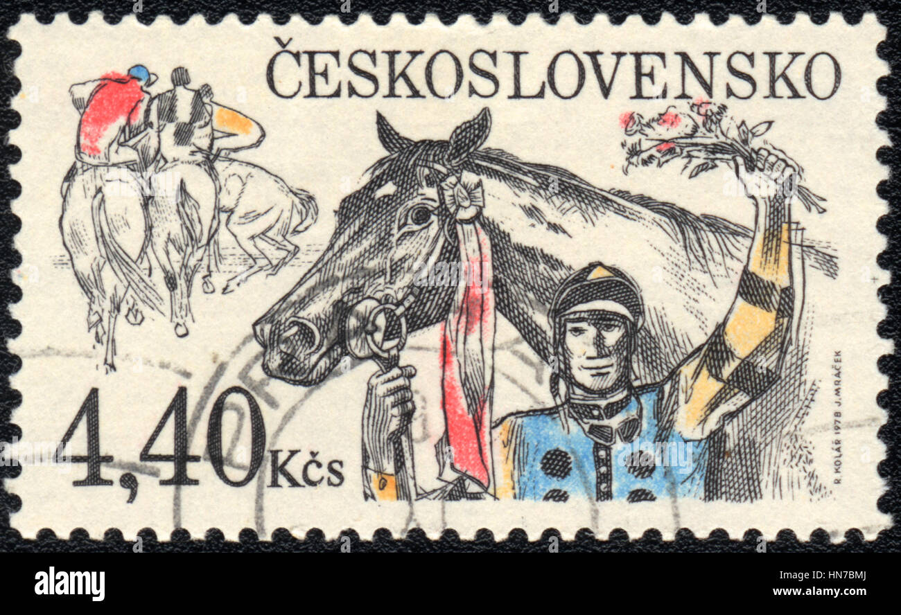 A postage stamp printed in Czechoslovakia   shows  a  winner of the race, Equestrianism series , circa 1984 Stock Photo