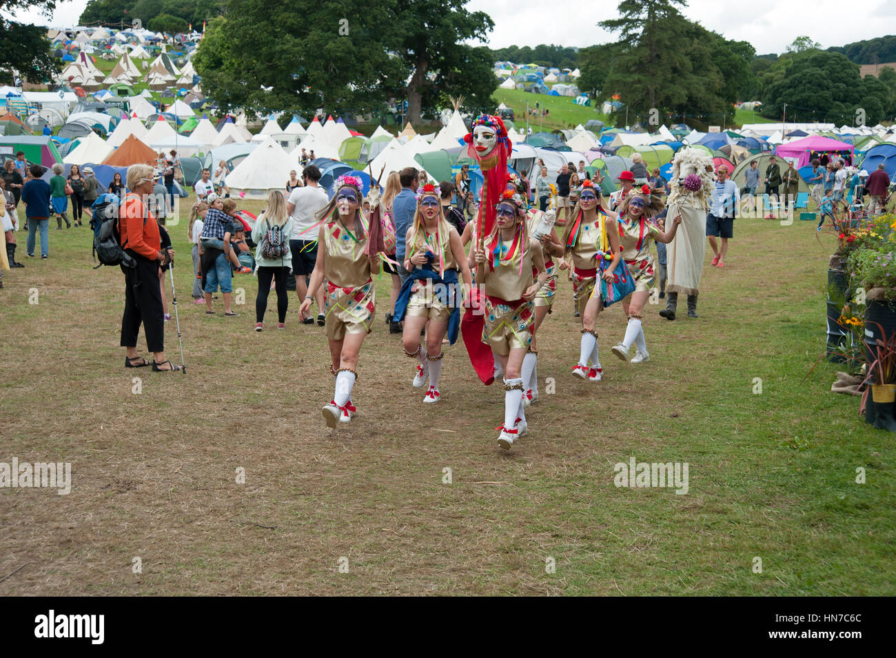 A group of female Morris dancers perform at the Port Eliot Festival Cornwall Stock Photo